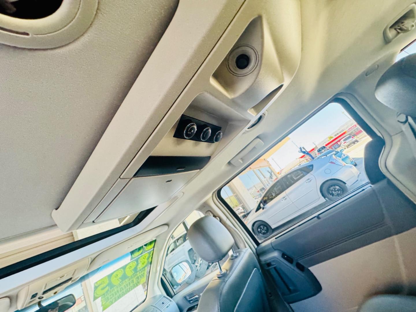 2008 White /black Dodge Caravan (2D8HN54XX8R) , located at 2190 Hwy 95, Bullhead City, AZ, 86442, (928) 704-0060, 0.000000, 0.000000 - 2008 Dodge caravan SXt. leather loaded, backup camera, bluetooth, satellite radio, rear tv,dvd player. moonroof. stow and go seating. seating for 7. rear folds down for bed. has table . free Carfax , free warranty. - Photo#3